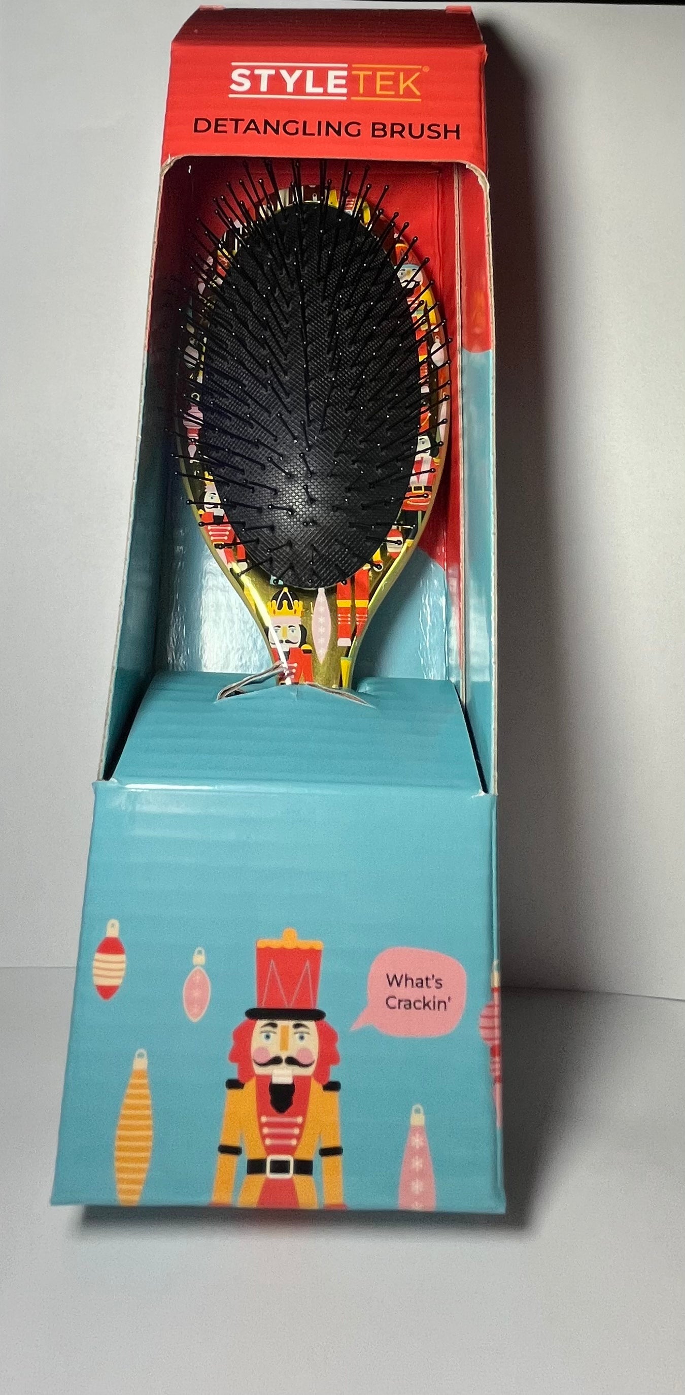 Detangling hair brush.